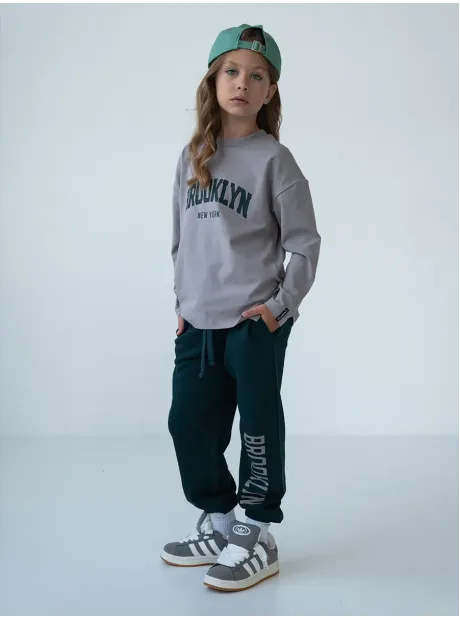 Зеленый спортивный костюм для девочки