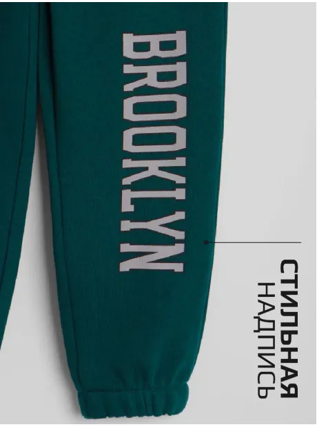 Зеленый спортивный костюм для девочки