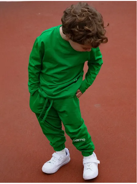 Спортивный костюм для мальчика зеленый
