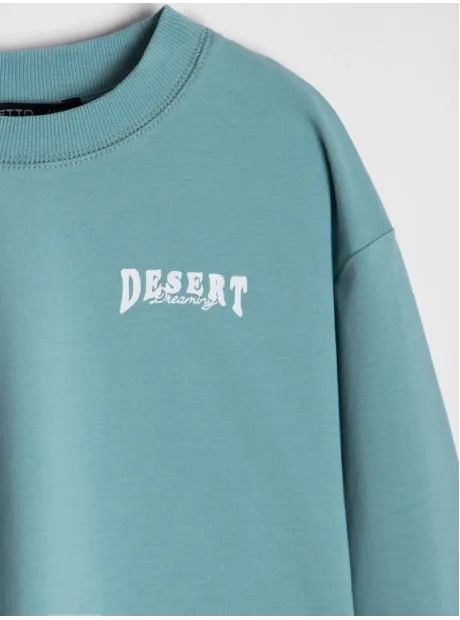 Зеленый спортивный лонгслив для девочки